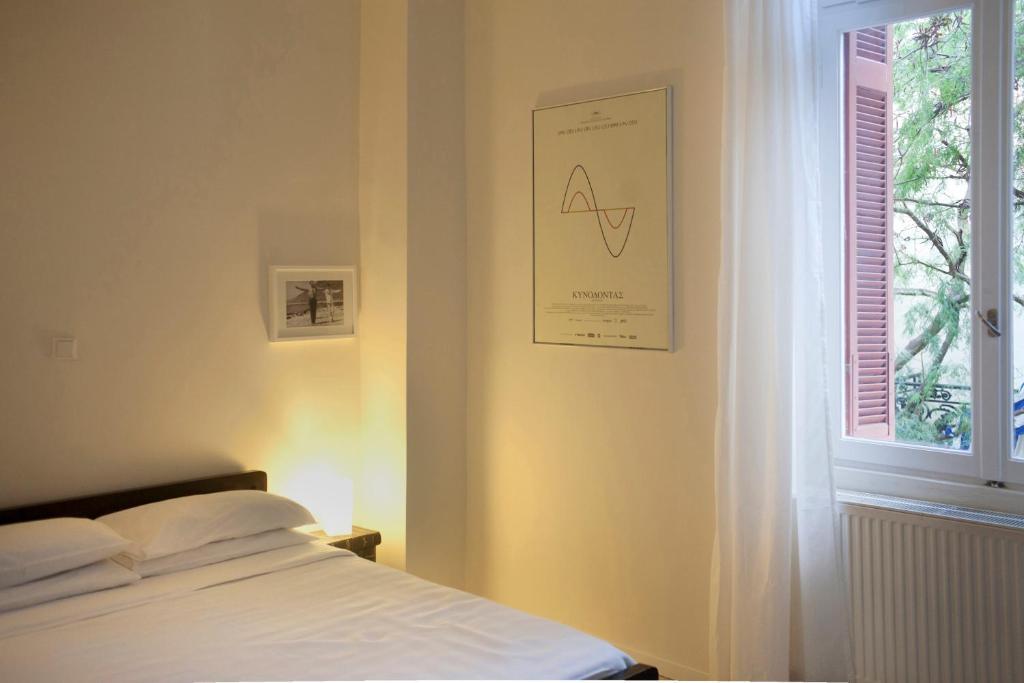 Alice Inn Atény Pokoj fotografie